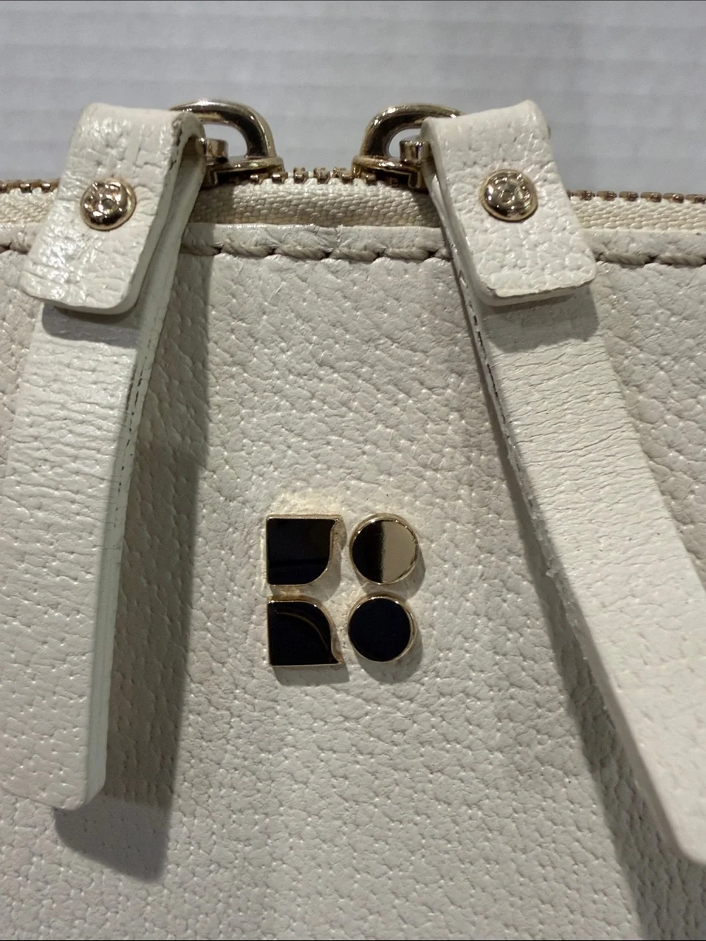 kate spade Cream/Off-White Pebbled Leather Satchel with Front Zip Pocket